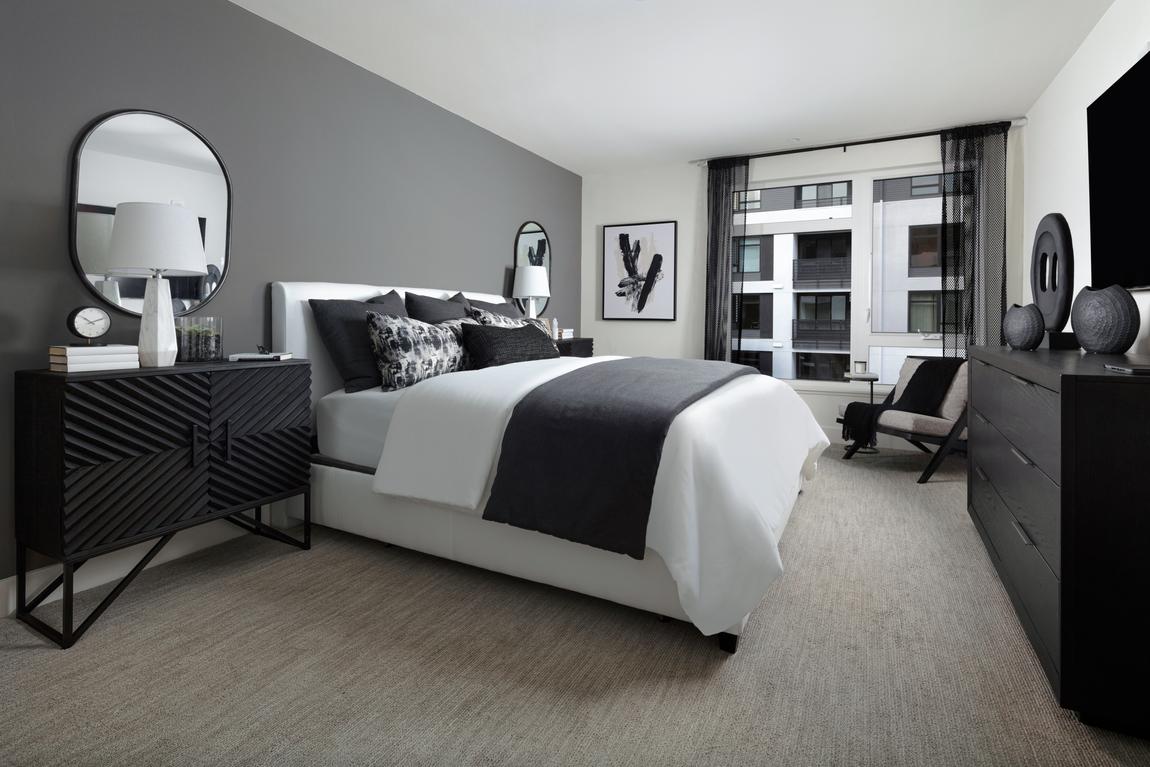 Bedroom featuring black and white interior design