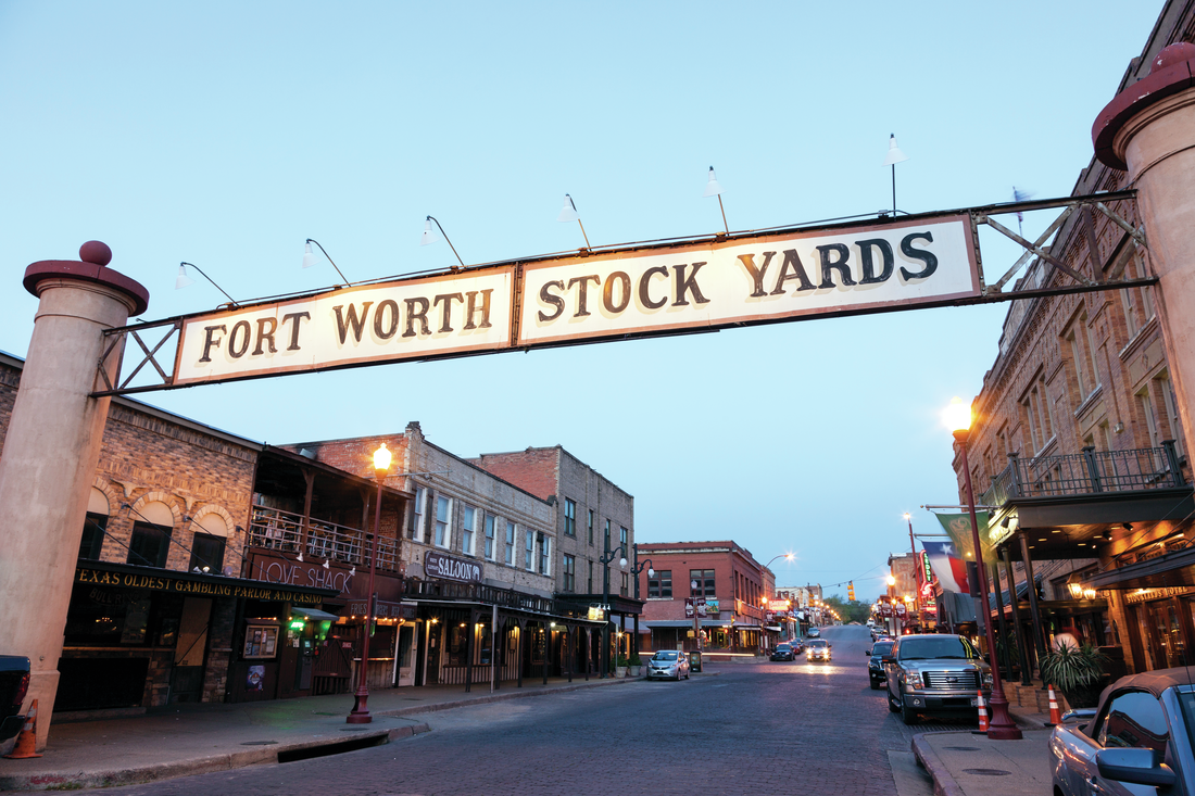 Fort Worth Stock Yards banner into town of Dallas. 